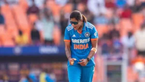 India women's cricketer Radha Yadav celebrates after taking a wicket during an international cricket match.