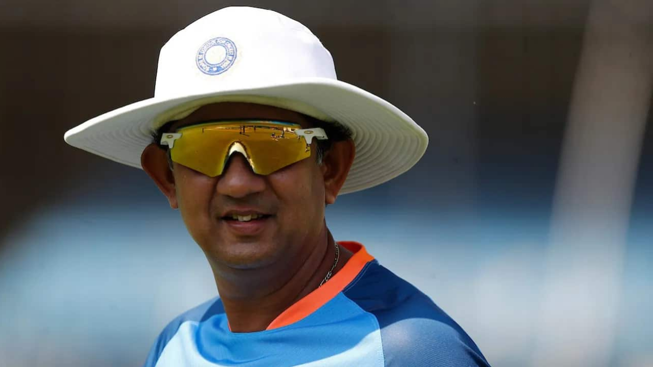 Sairaj Bahutule, former India cricketer and cricket coach, wearing a wide-brimmed hat and sunglasses during a training session.