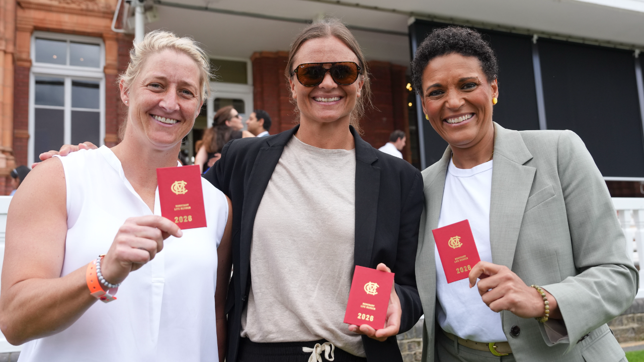 Sophie Devine, Suzie Bates and Mel Jones pose with their honorary life membership cards after being awarded Honorary Life Membership in 2026.