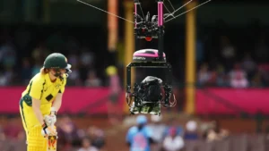 Spidercam aerial broadcast camera suspended above the cricket field during a Women’s T20 World Cup 2026 match, capturing live action between international teams.