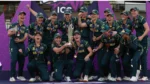 Australia women's cricket team celebrates with the ICC Women's T20 World Cup 2026 trophy after winning the championship, posing together with medals during the presentation ceremony.