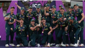 Australia women's cricket team celebrates with the ICC Women's T20 World Cup 2026 trophy after winning the championship, posing together with medals during the presentation ceremony.