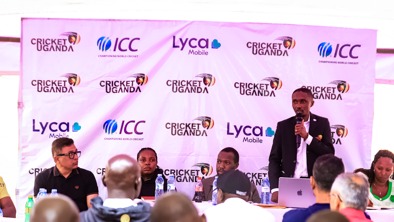 Cricket Uganda President Jackson Kavuma speaks during the Special General Meeting at Lugogo on July 18, with officials and attendees seated at the event sponsored by Lyca Mobile and supported by the ICC.