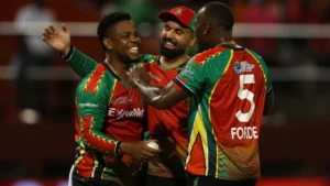 Guyana Amazon Warriors players celebrate a wicket during a Global Super League (GSL) match, highlighting the team's success in the tournament.