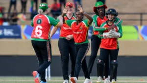 Guyana Amazon Warriors women players celebrate a wicket during a Women's Caribbean Premier League (WCPL) match.