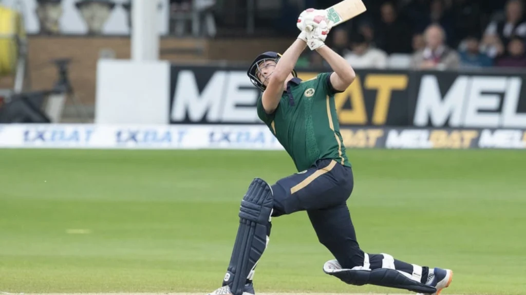Ireland batter Harry Tector plays an attacking lofted shot during an international cricket match.