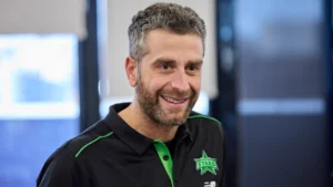 James Rosengarten, General Manager of Melbourne Stars, smiling during a media appearance while wearing the Melbourne Stars team polo.