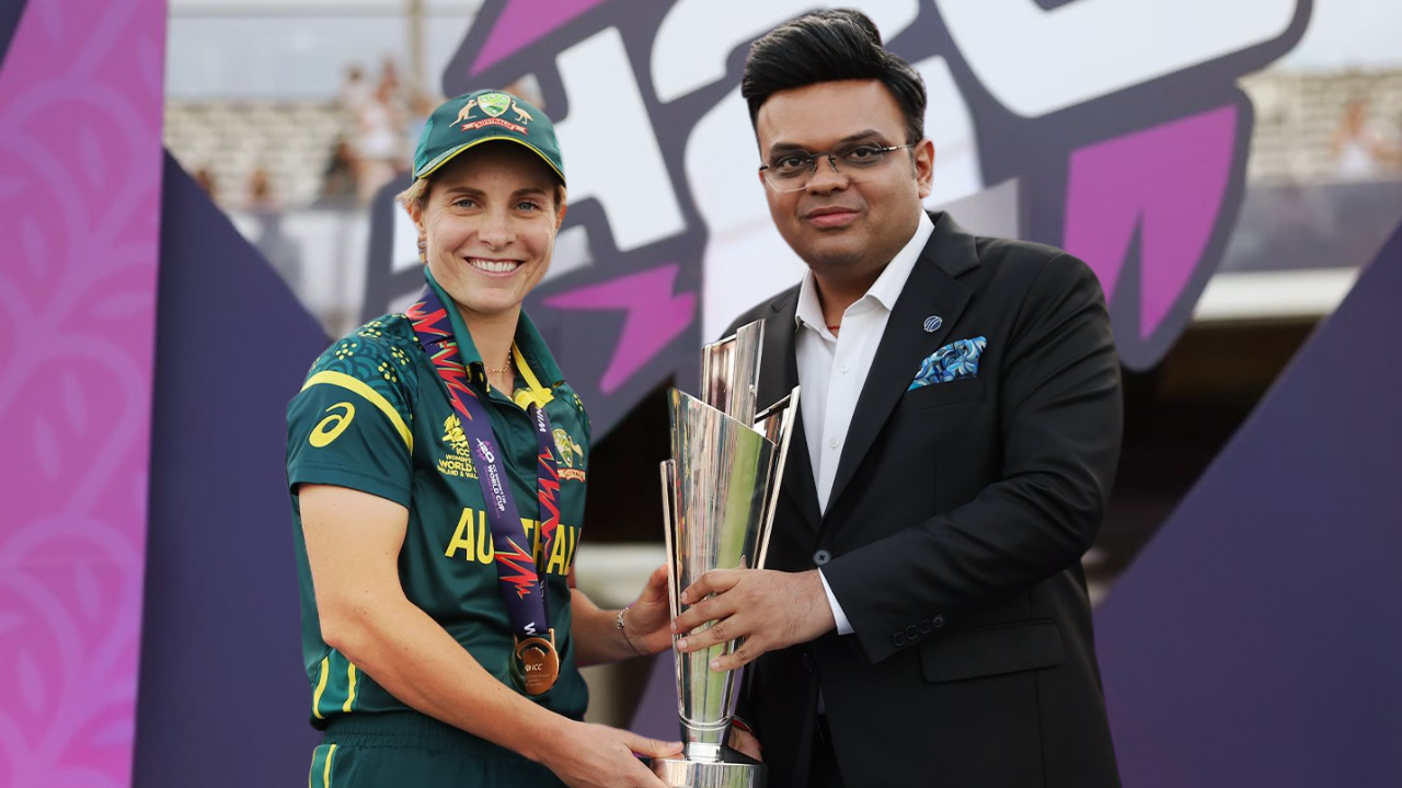 ICC Chairman Jay Shah presents the ICC Women's T20 World Cup trophy to Australia captain Sophie Molineux during the post-final presentation ceremony.