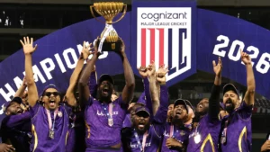 Los Angeles Knight Riders players celebrate after winning the 2026 Major League Cricket championship, lifting the MLC trophy during the title presentation ceremony.