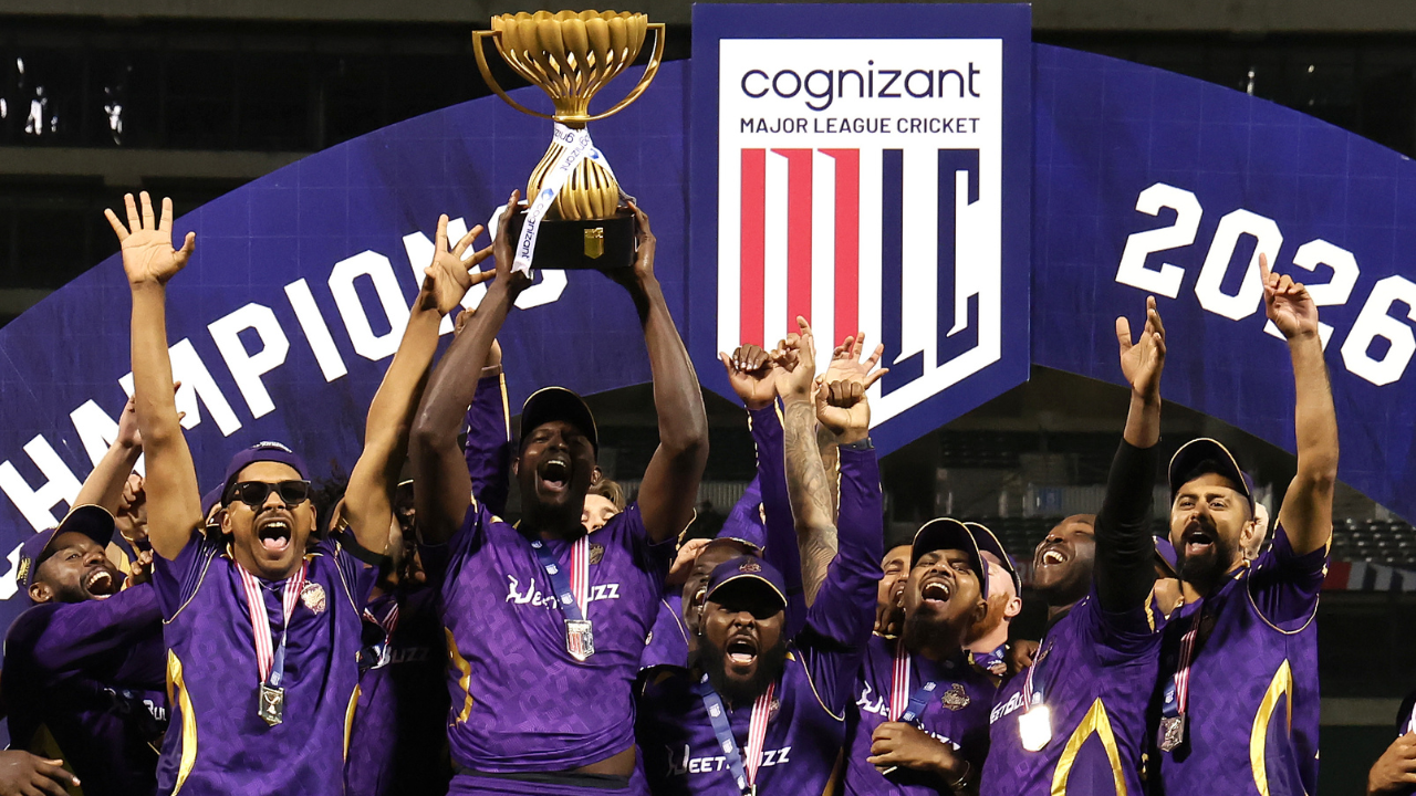 Los Angeles Knight Riders players celebrate after winning the 2026 Major League Cricket championship, lifting the MLC trophy during the title presentation ceremony.