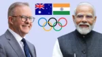 Indian Prime Minister Narendra Modi and Australian Prime Minister Anthony Albanese with the India and Australia flags and Olympic rings, representing India-Australia cooperation ahead of the 2032 Brisbane Olympics.