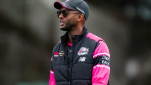 Peter Clarke during a Sydney Sixers training session after being appointed as the club's WBBL head coach, wearing Sydney Sixers coaching apparel and sunglasses.