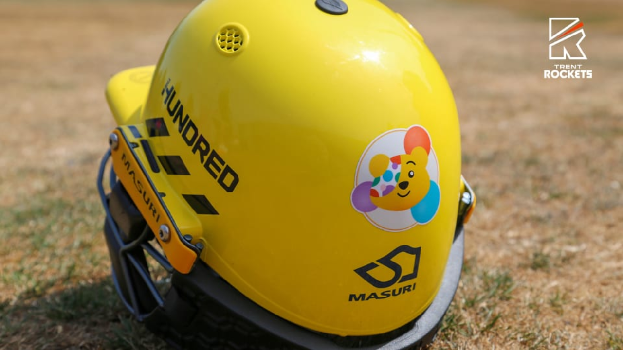 Trent Rockets cricket helmet featuring The Hundred branding and a BBC Children in Need Pudsey Bear sticker during The Hundred cricket competition.