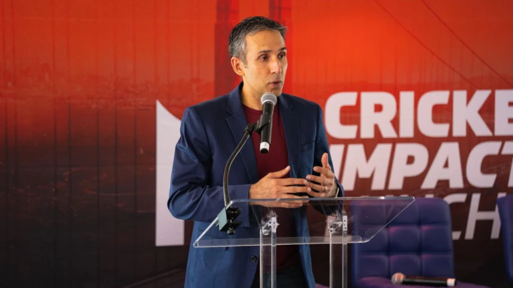 cricexec Founder and Publisher Zee Zaidi delivers opening remarks as the event emcee at the Cricket Impact Summit 2026.