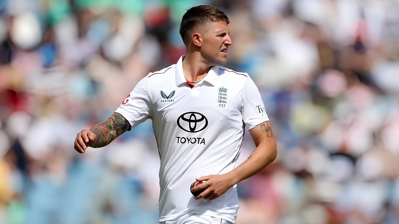 England fast bowler Brydon Carse holds the ball during a Test cricket match.