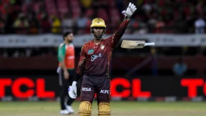 CPL batter raises his hand during a Caribbean Premier League match