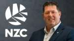 Geoff Allott pictured alongside the New Zealand Cricket NZC logo.