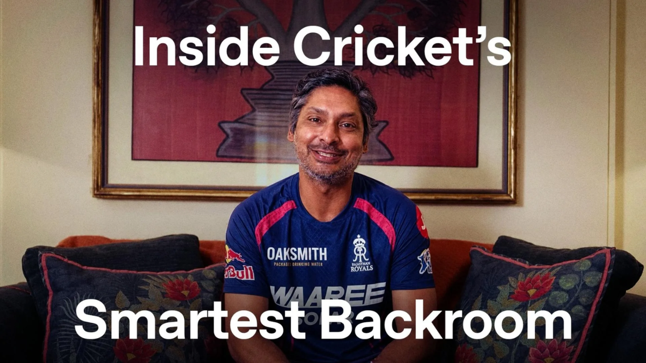 Kumar Sangakkara speaking about cricket while wearing a Rajasthan Royals jersey