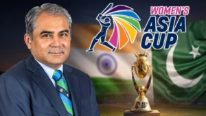 Mohsin Naqvi pictured with the Women’s Asia Cup trophy and the flags of India and Pakistan.