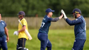 PCA Legends players celebrate a wicket during a cricket match