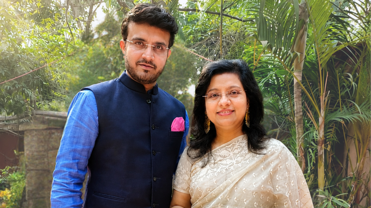 Sourav Ganguly and Dona Ganguly posing together outdoors