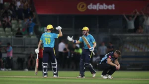 Warwickshire cricketers celebrate during a T20 cricket match.