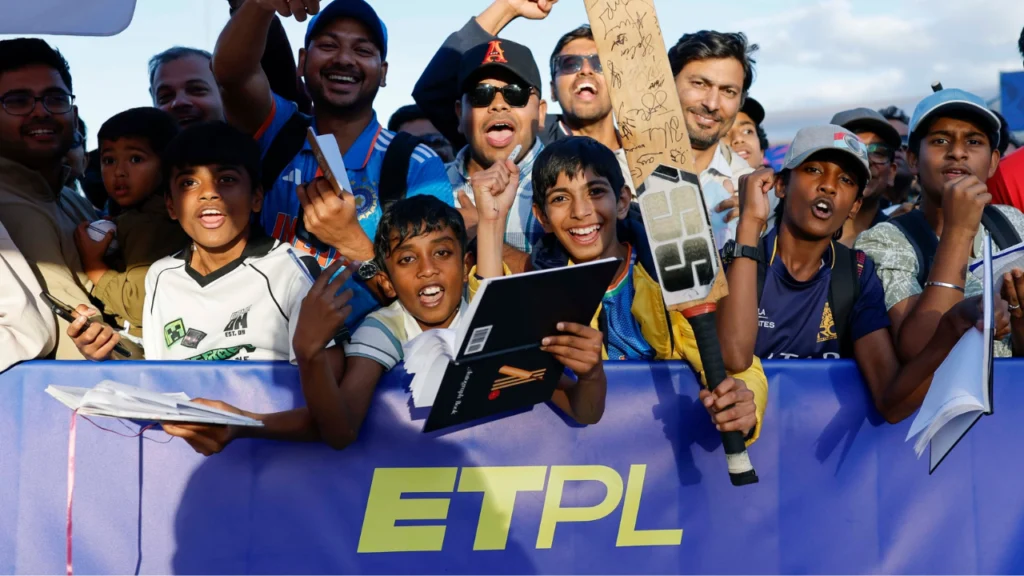 Amsterdam Flames fans cheer for their team during an ETPL cricket match.