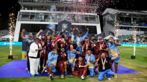 Antigua and Barbuda Falcons celebrate their CPL title win with the trophy