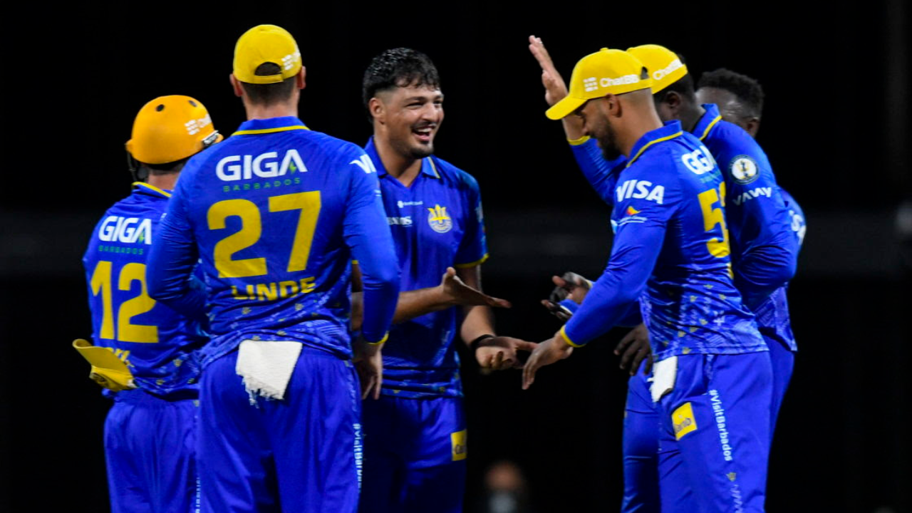 Barbados Tridents cricketers celebrate together during a Caribbean Premier League match