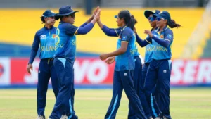 Sri Lanka women's cricket captain Chamari Athapaththu celebrates Pratika Rawal's wicket with teammates during a cricket match
