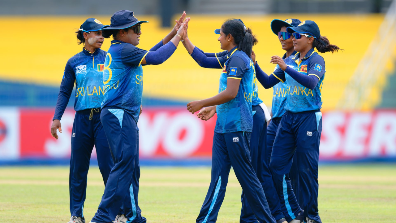 Sri Lanka women's cricket captain Chamari Athapaththu celebrates Pratika Rawal's wicket with teammates during a cricket match