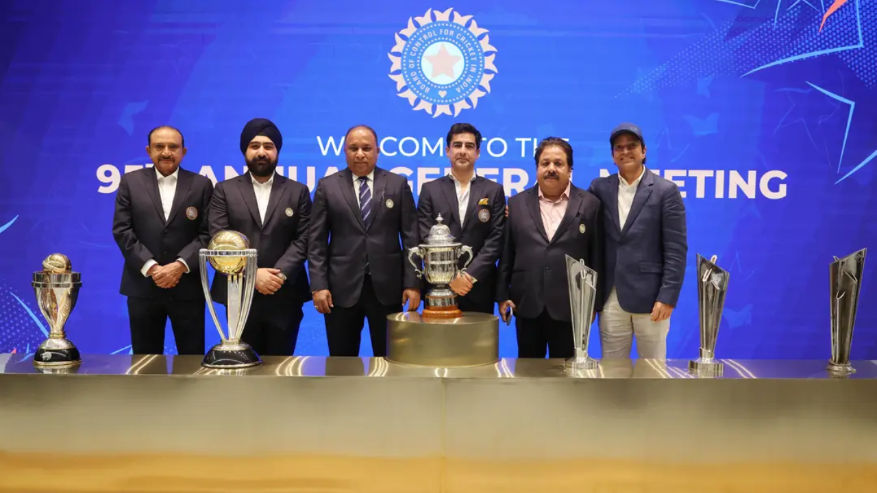 Devajit Saikia, Mithun Manhas, Rajeev Shukla, A. Raghuram Bhat and Prabhtej Bhatia with BCCI trophies at the annual general meeting.