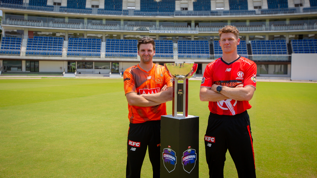 Jhye Richardson and Brendan Doggett with the Big Bash League trophy at Chepauk Stadium in Chennai.