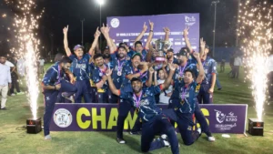 Kuwait Falcons celebrate with the trophy after being crowned champions of the DP World ILT20 Development Tournament.
