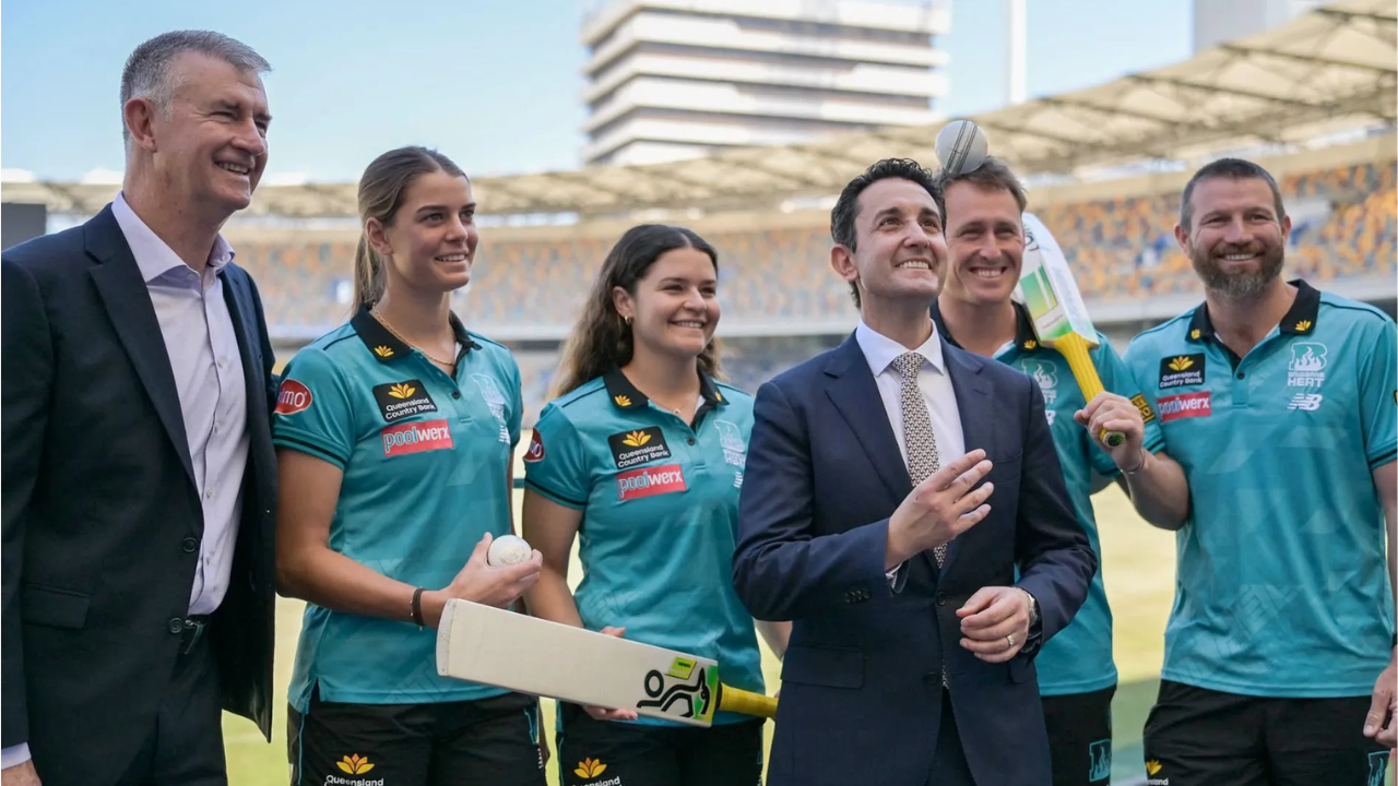 Marnus Labuschagne, Michael Neser, Lilly Bassingthwaighte and Mikayla Wrigley with Queensland Premier David Crisafulli at a cricket ground