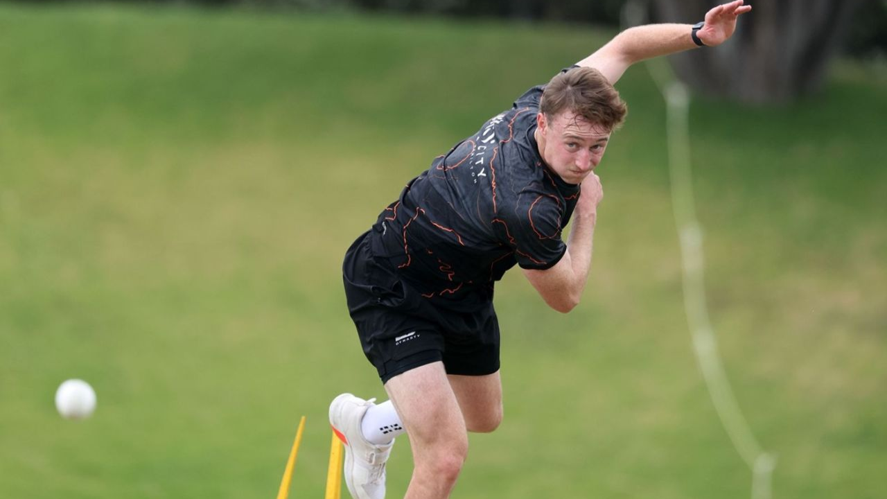 Matthew Fisher bowling during a cricket net practice session.