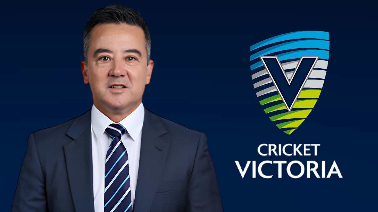 Shaun Richardson pictured alongside the Cricket Victoria logo.