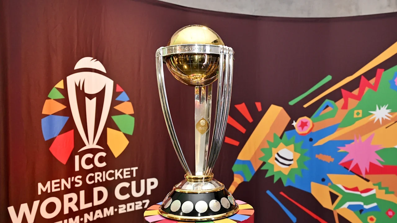 ICC Men’s Cricket World Cup 2027 trophy on display with the tournament logo in the background.
