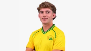 Jason Rowles wearing the yellow and green Joburg Super Kings jersey in an official player portrait for the SA20 cricket league.