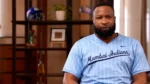 Kieron Pollard wearing a light blue Mumbai Indians jersey during an indoor interview.