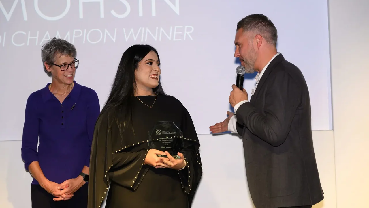 Maha Mohsin receives the Lord’s Taverners Impact Award at The Kia Oval in 2026, holding her trophy during the award presentation ceremony.
