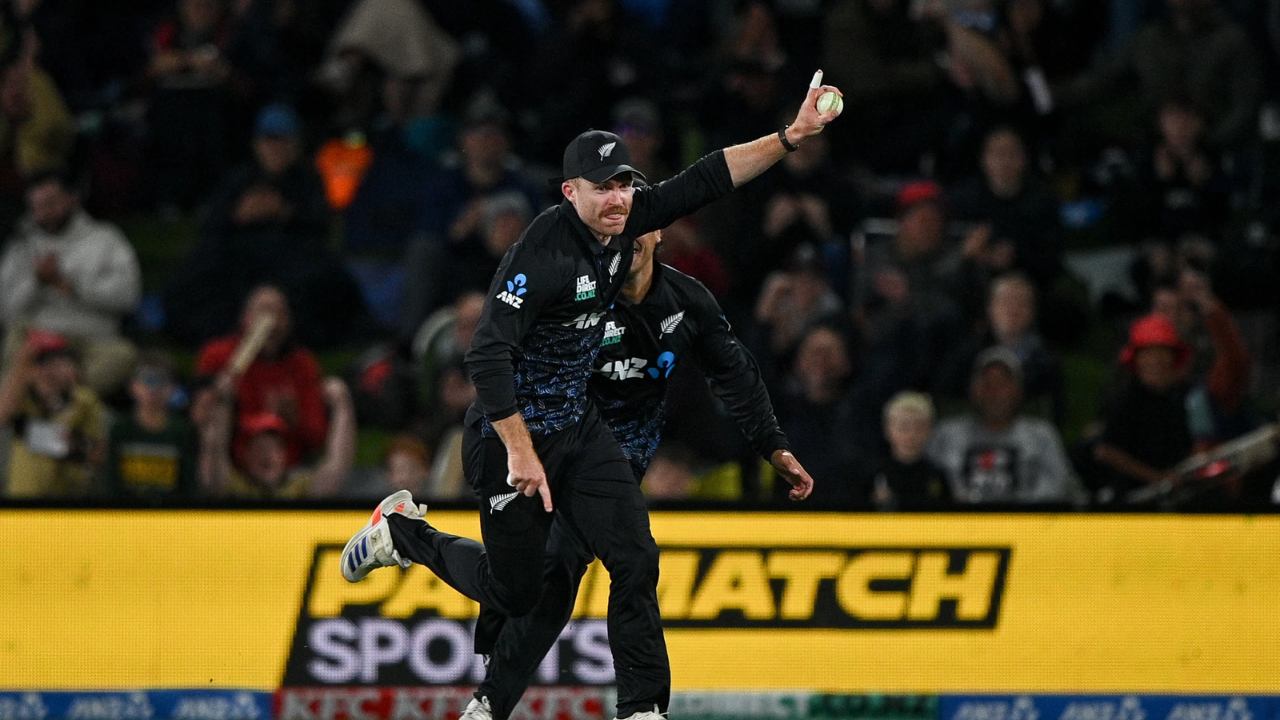 Nick Kelly celebrates after taking a catch for New Zealand